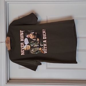 Novelty Dick Cheney "Never Hunt With A D**k" short-sleeved T-shirt.